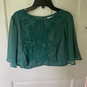 Fluttering embroidered top